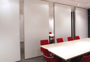 Sliding folding partitions used in hotels for banquet halls and flexible space management solutions